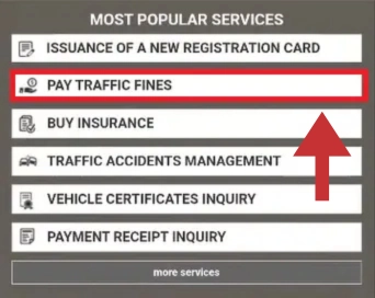 Menu-list-of-popular-UAE-vehicle-services-highlighting-the-Pay-Traffic-Fines-option-with-a-red-box-and-arrow.